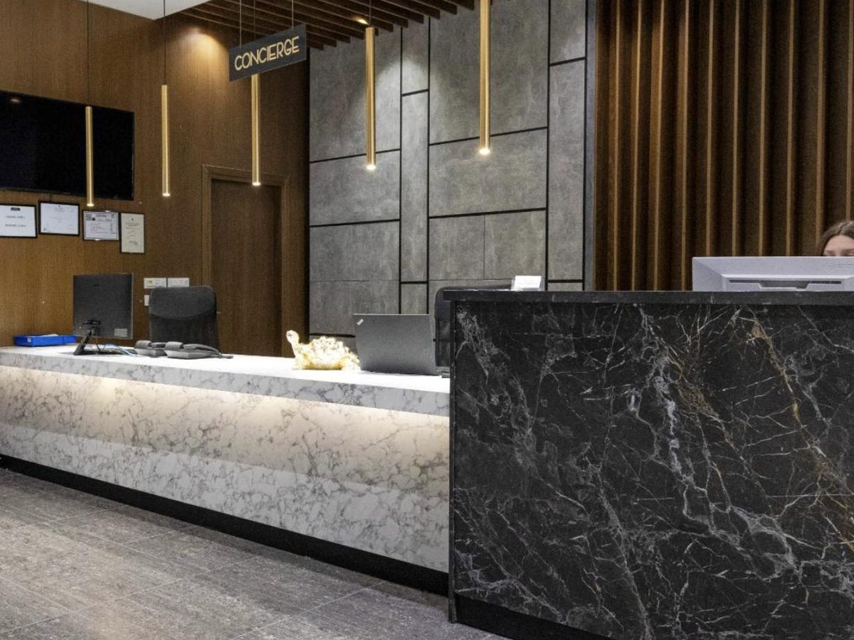 Ajsel Hotel reception with marble desks